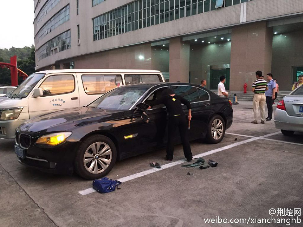 Suspecting husband of cheating, wife smashes his BMW car