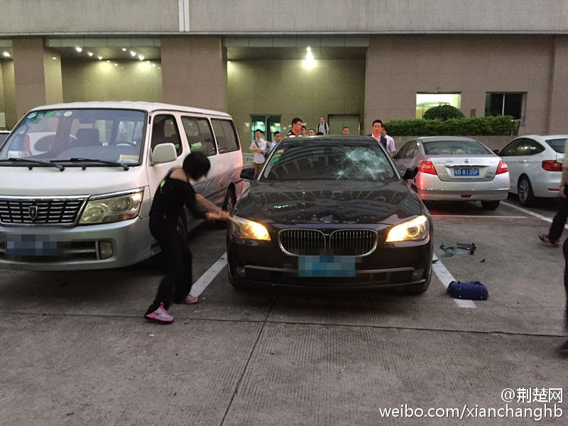 Suspecting husband of cheating, wife smashes his BMW car