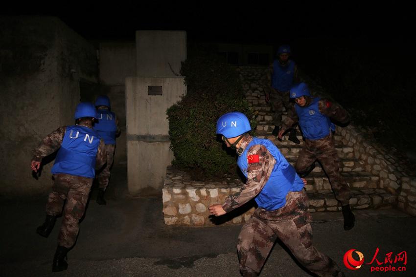 Military engineers with the Chinese peacekeeping force in Lebanon encounter air raids