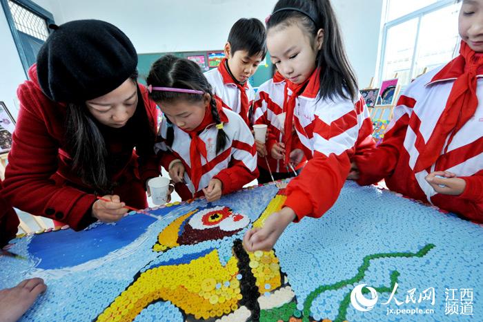 Left behind children welcome the New Year by ‘painting’ monkey with buttons
