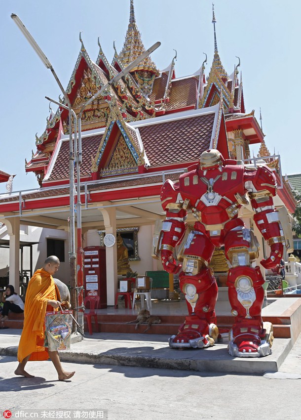 Buddhist temple sets up superhero figures to attract young visitors