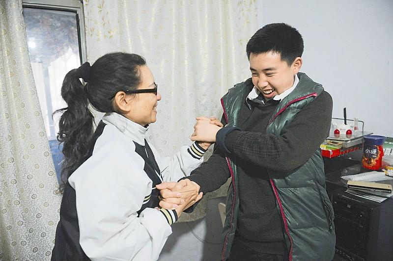 Mother demonstrates love for autistic son by becoming his 'classmate'