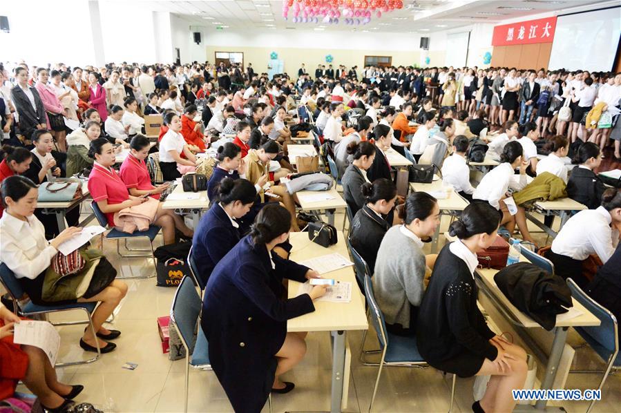 Applicants attend airline stewardess audition in Harbin, NE China