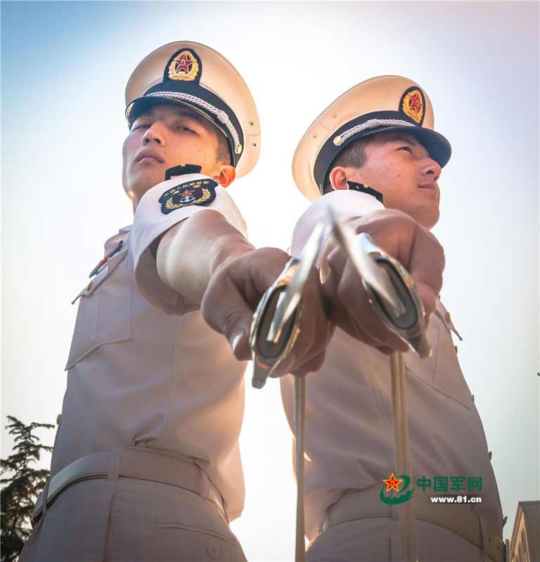 Swords conferred upon naval academy graduates