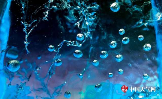 Beautiful view of ice illuminated by coloured lights