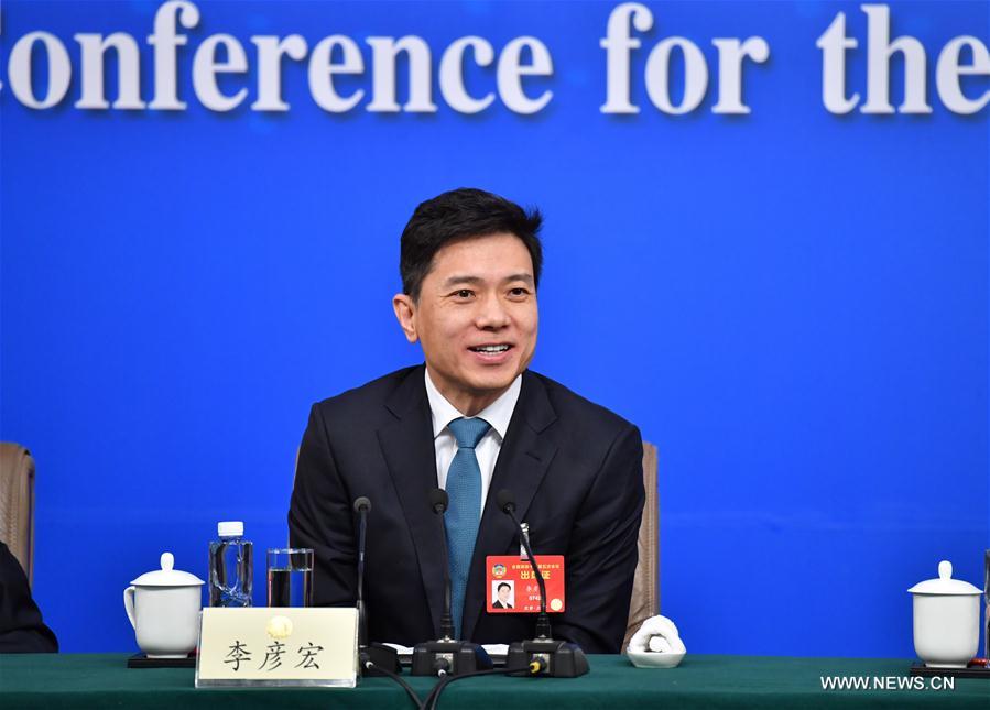 CPPCC members attend press conference on benefiting society and people