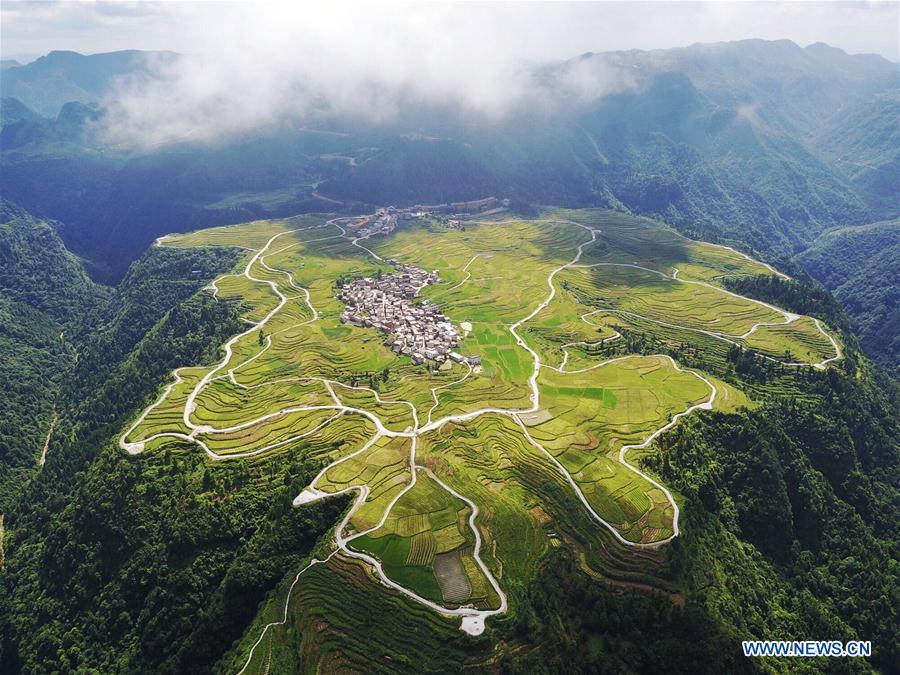 Bird's-eye view of farmland and villages in SW China's Guizhou