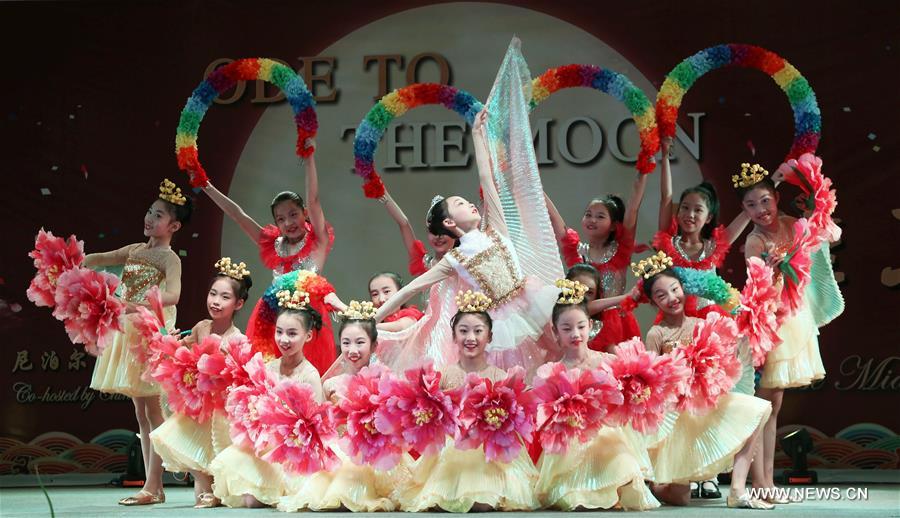 Children dance to celebrate Chinese Mid-Autumn Festival in Nepal