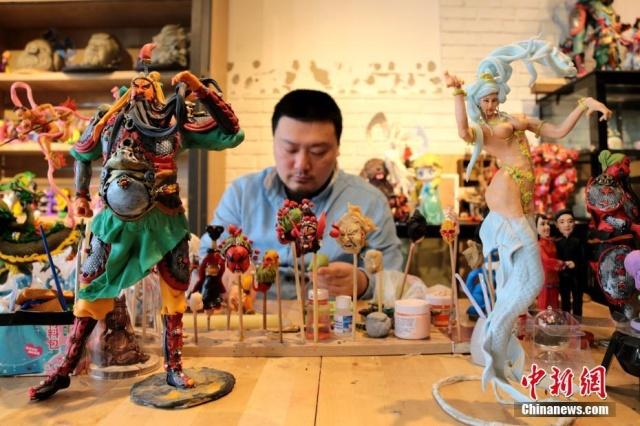 Chinese man inherits intangible cultural heritage, makes figurines with dough