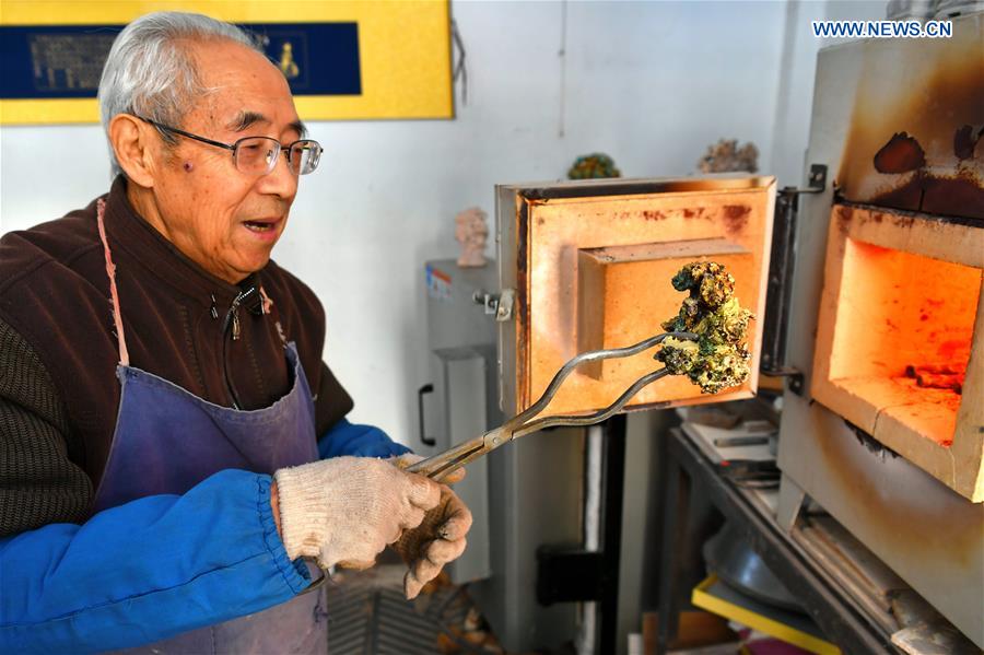 Inheritor of coloured glaze firing skill transforms waste into artwork in China's Shanxi