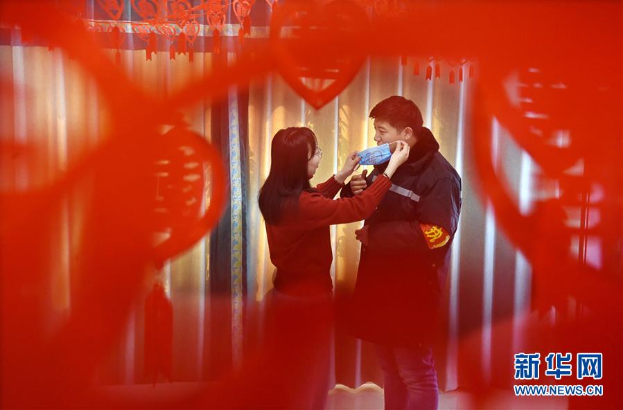 Newly-weds put duty above romance in battle against coronavirus