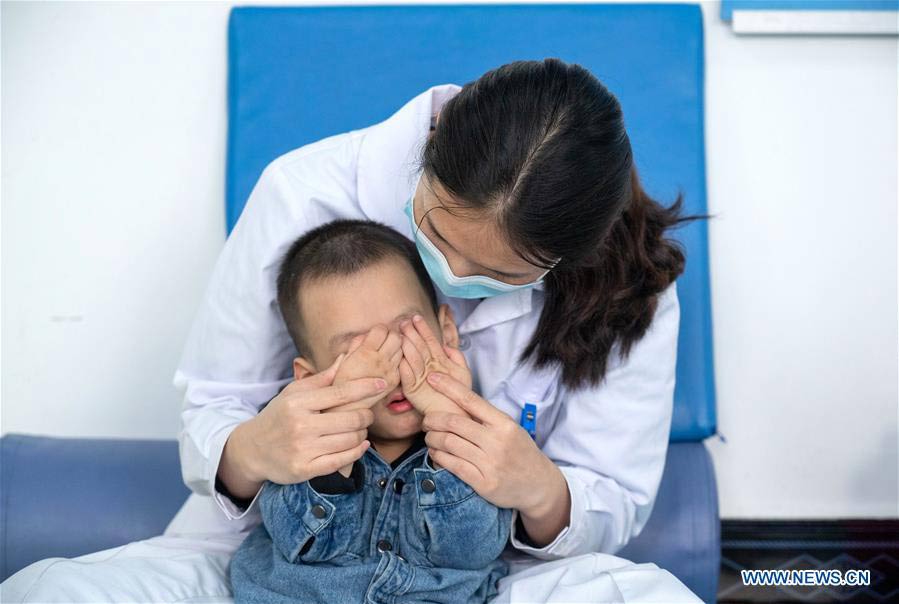 Children with disabilities attend rehabilitation course in Hunan