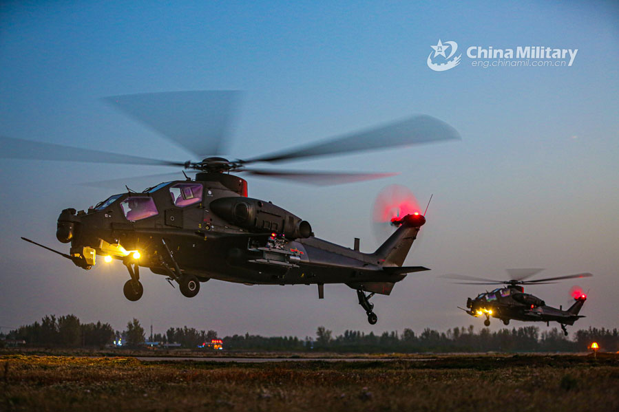 Multi-type attack helicopters hover at low altitude