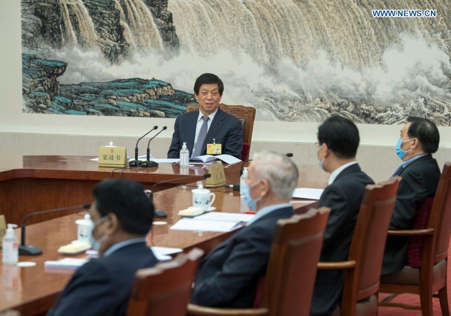 Senior lawmakers hear reports on law deliberations