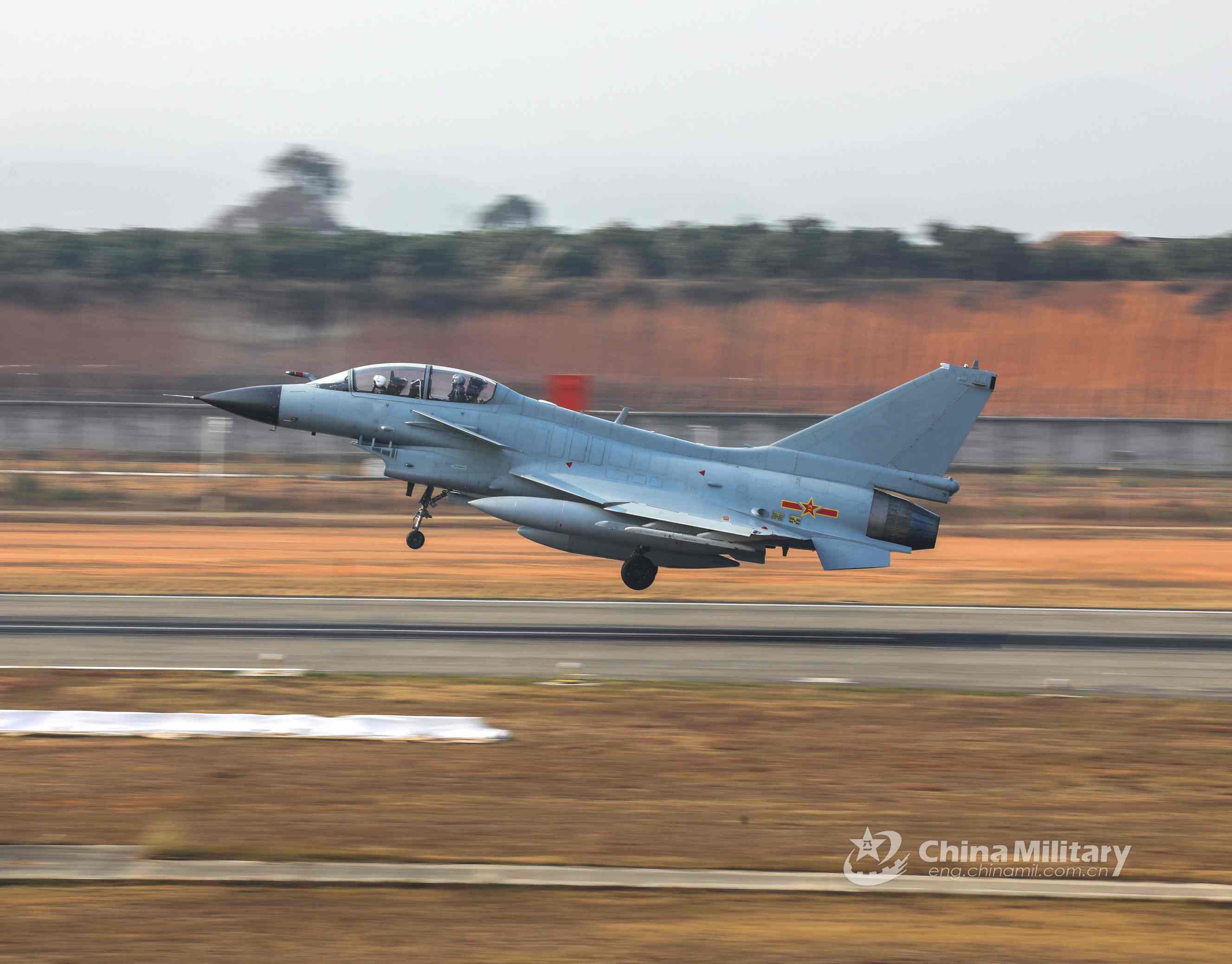 Fighter jets accelerate to take off
