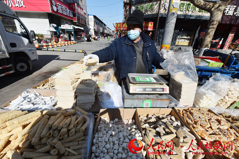 People shop for Spring Festival in Xiongan New Area