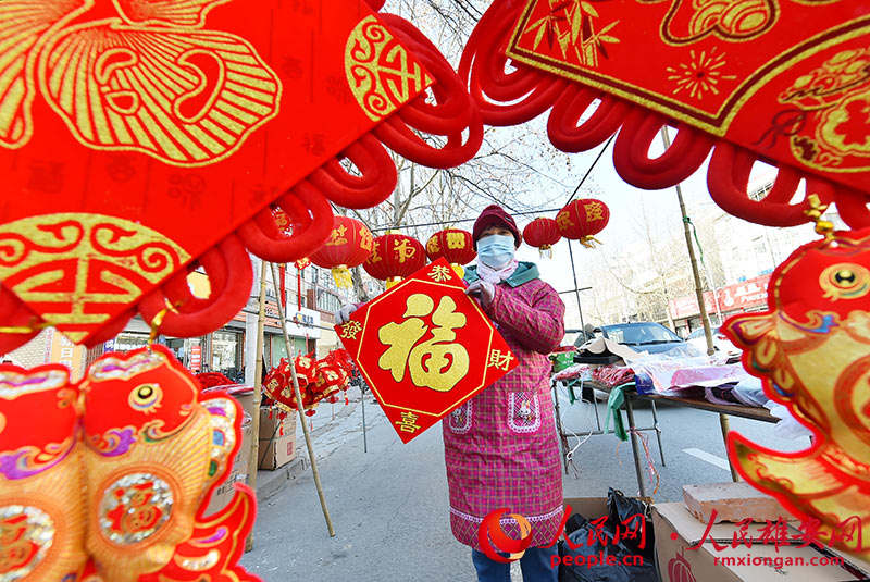 People shop for Spring Festival in Xiongan New Area