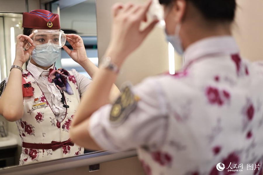 Train attendant witnesses changes brought by high-speed railway service in SW China