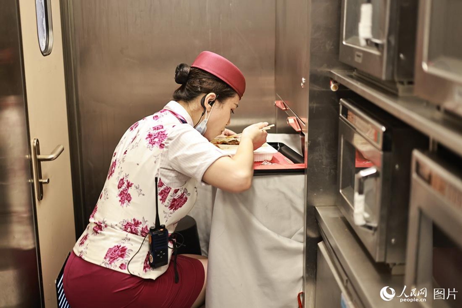 Train attendant witnesses changes brought by high-speed railway service in SW China
