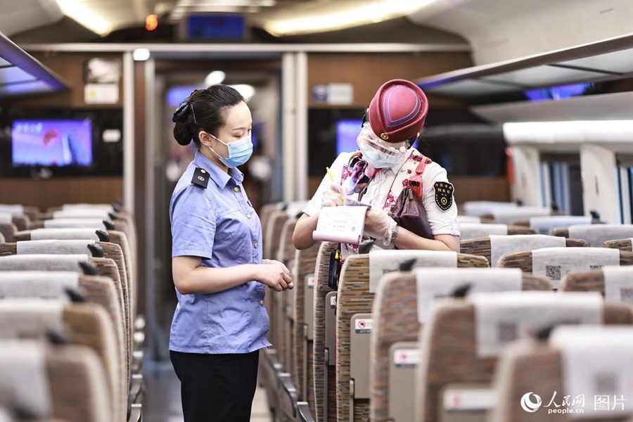 Train attendant witnesses changes brought by high-speed railway service in SW China