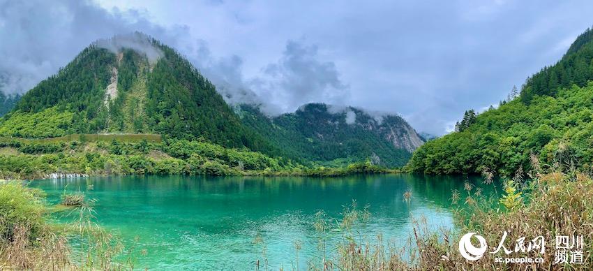 Chinese scenic spot Jiuzhaigou fully opens after quake