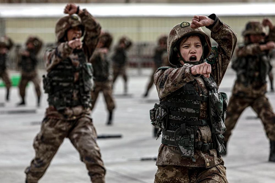 Female soldiers complete first parachute jump in Tibet