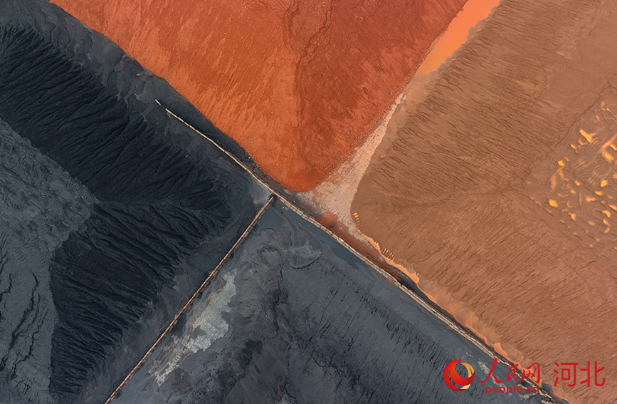 Tangshan Port in N China's Hebei bustles with cargo operations