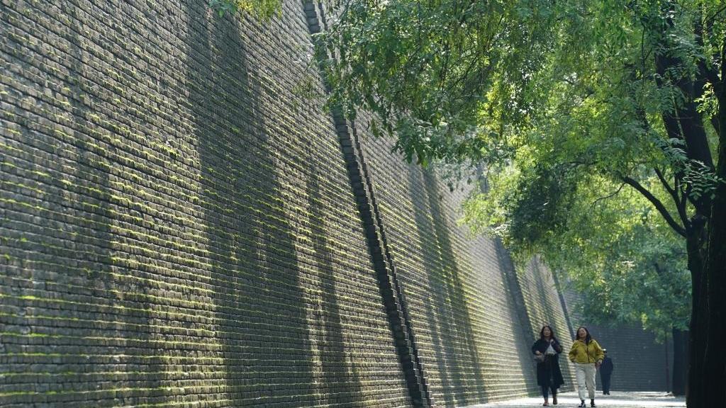 City wall covered with green coat attracts visitors in Xi'an, NW China