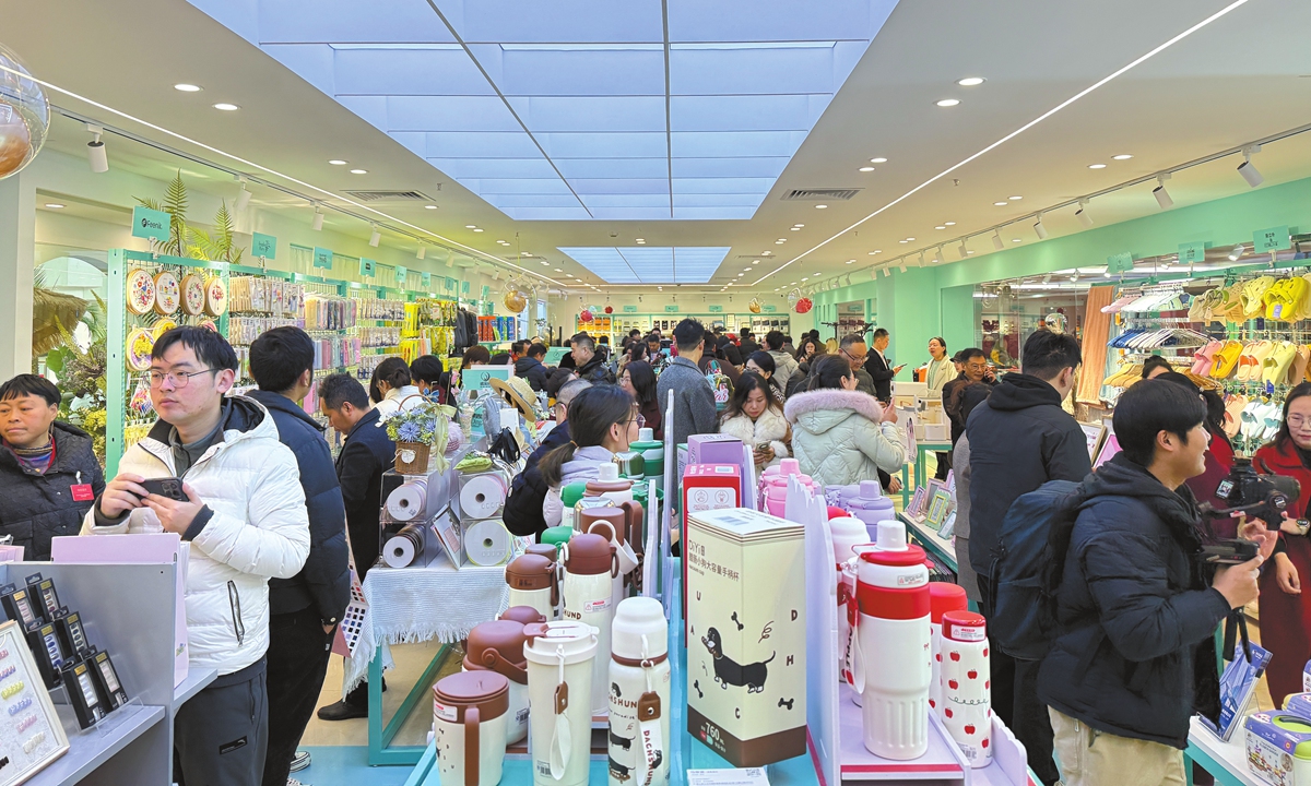 Bustling scenes at the opening day of the first global store of 