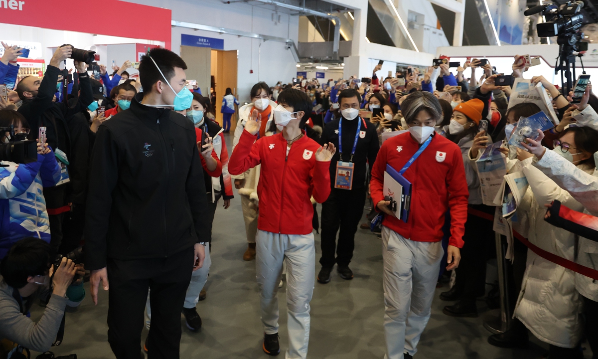 Japanese two-time Olympic champion figure skater Yuzuru Hanyu (center) holds a press conference in Beijing on Monday evening where he took questions from global reporters. Photo: Li Hao/Global Times