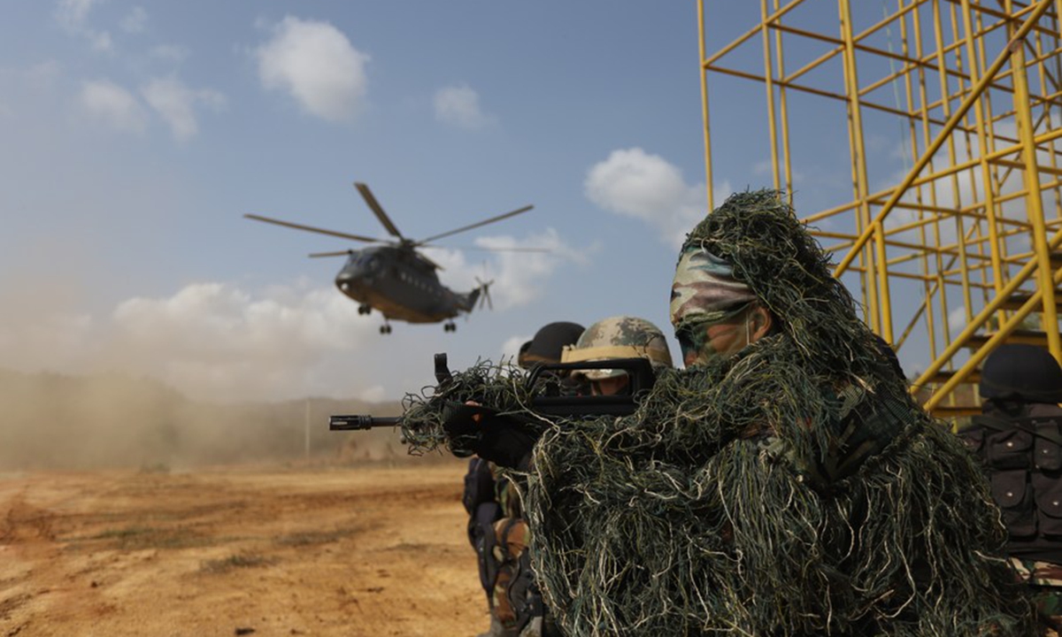 Soldiers take part in the Dragon Gold 2020 joint drill in Cambodia's southwestern Kampot province, March 26, 2020. (Xinhua)