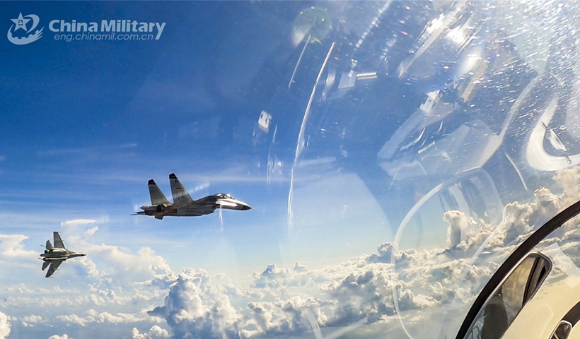 Fighter jets attached to a naval aviation brigade under the PLA Southern Theater Command fly in formation during a day-and-night flight training exercise in early March, 2023. (eng.chinamil.com.cn/Photo by Fu Jinquan)