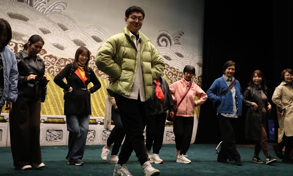 A group of middle-aged women from the social club Funclub learned basic Peking opera movements to enrich their cultural lives on November 5, 2024. Photo: Courtesy of Liu Jing