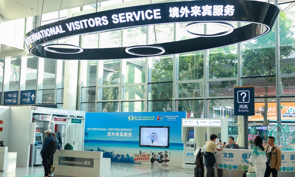 Passengers take a walk at the international visitors service desk at the Haikou Meilan International Airport in Haikou, South China's Hainan Province, on December 14, 2025. Photo: Courtesy of Haikou Meilan International Airport